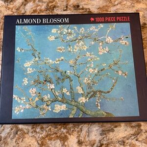 1,000 Piece RSVLTS Almond Blossom Puzzle - NEW
